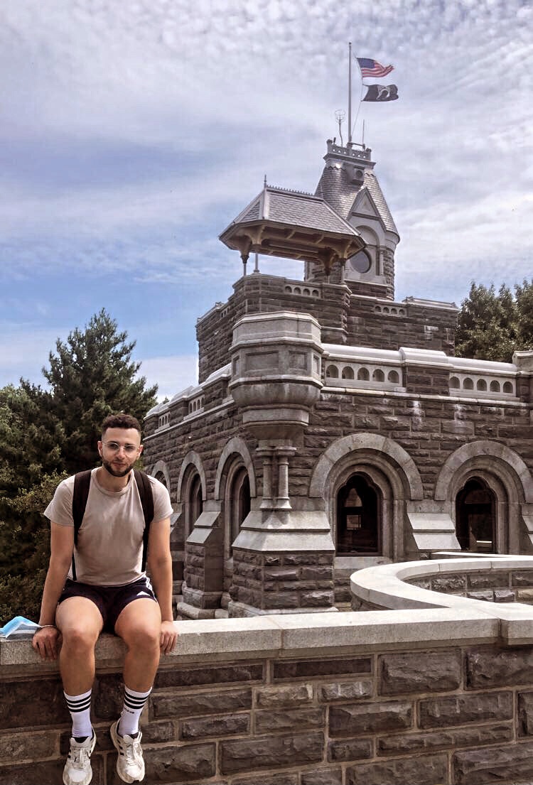 Samer in front of a castle