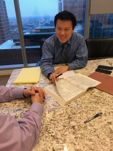 Peter Cheun with a client.