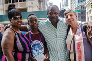 Photo of Jean with family and community members at a rally