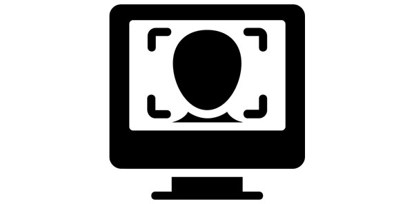 Black and white illustration of a computer screen with the image of a face