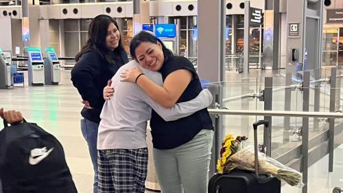 Vanessa and her son reuniting at the airport