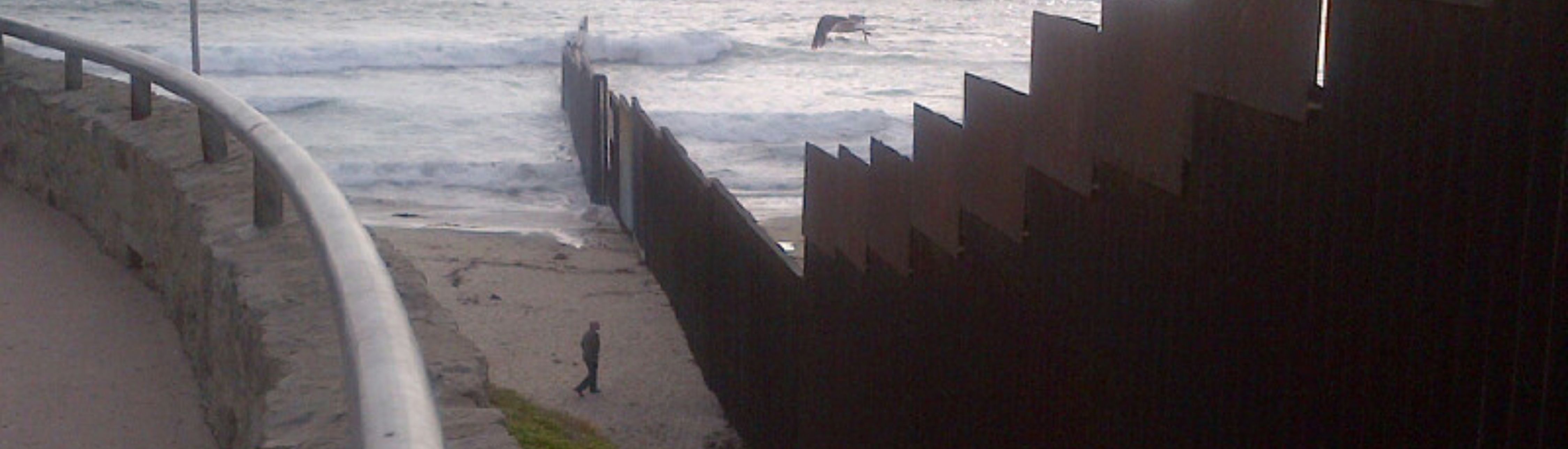 Border wall between Mexico and U.S. extending into the ocean