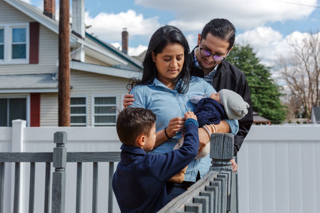immigrant family outside home