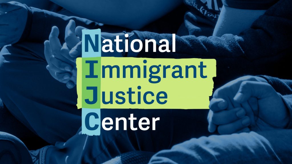 National Immigrant Justice Center logo over a blue-toned closeup image of three people sitting in a row clasping hands in solidarity